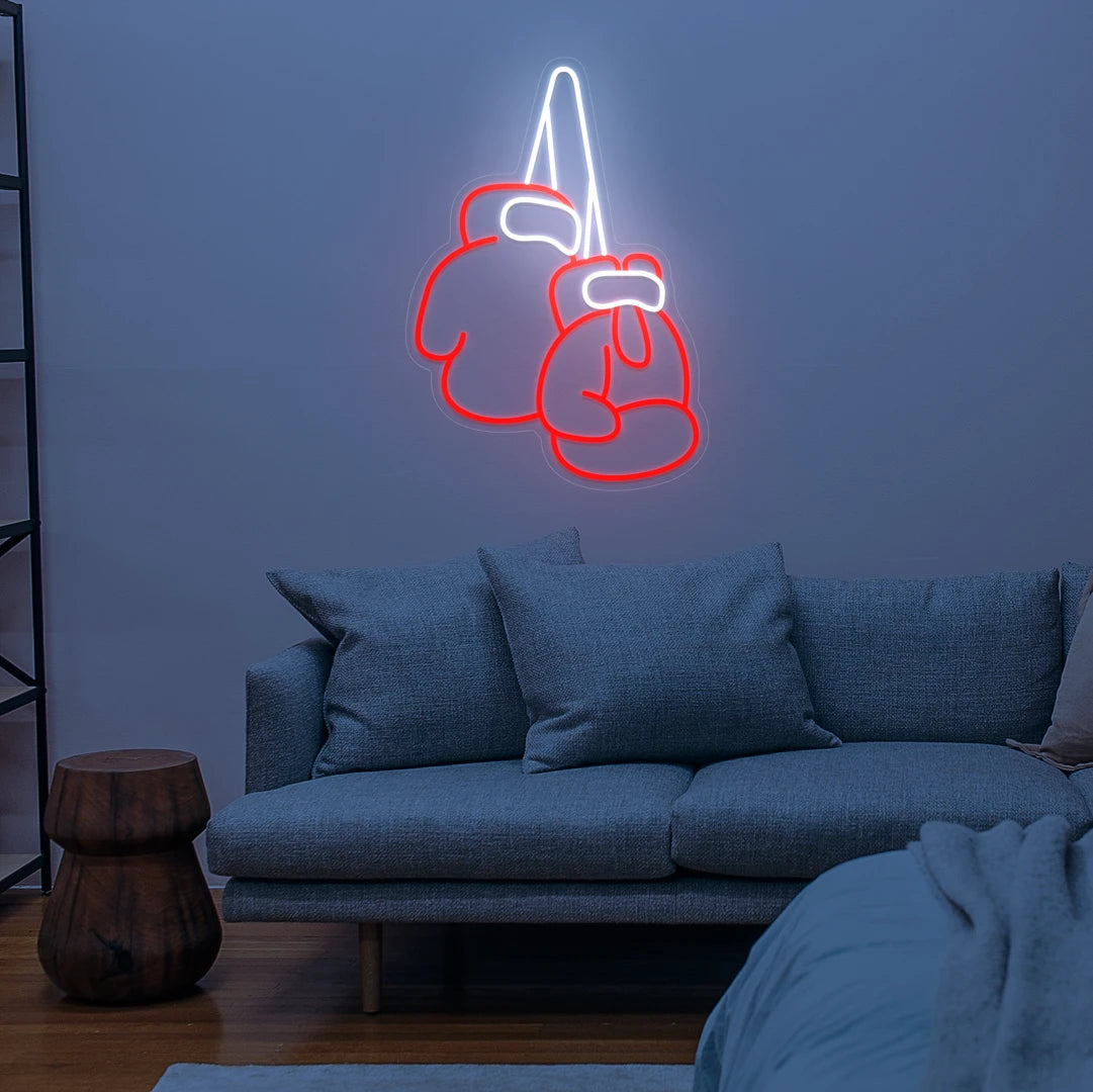 Néon gants de boxe rouge dans un salon