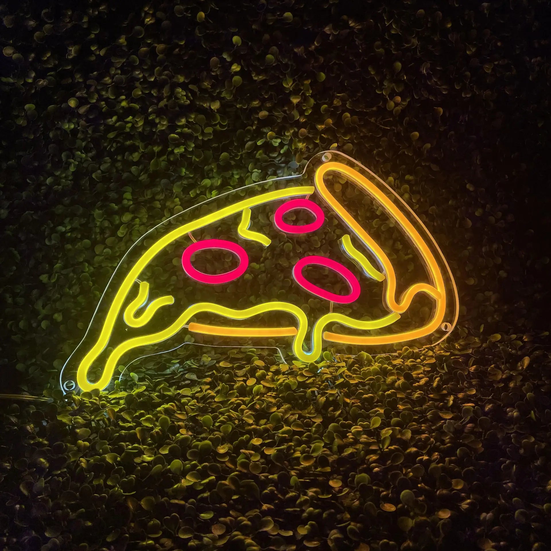 Néon Pizza dans le noir